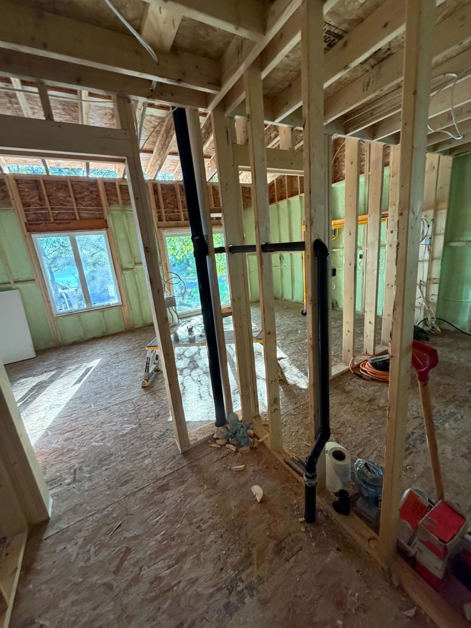 Drain and vent plumbing installed throughout a framed home